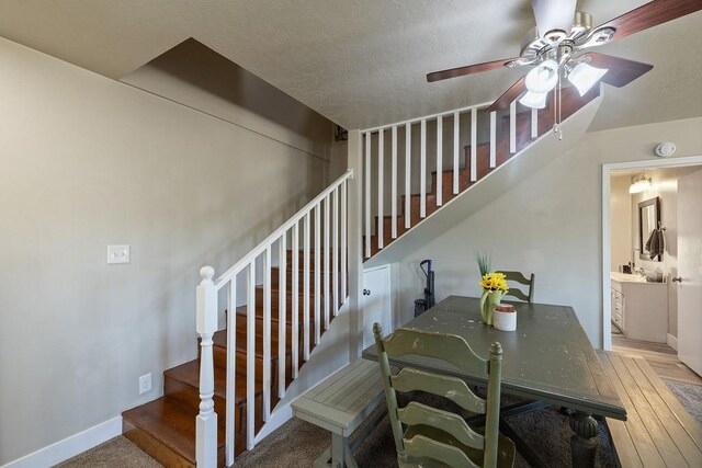 42640 Pinecone Ln, Auberry, CA 93602 - staircase featuring a ceiling fan and baseboards