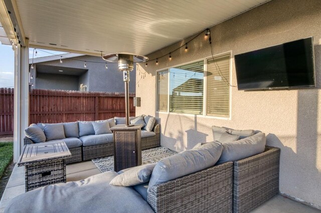 99 N Whittier Ave, Fresno, CA 93727 - view of patio / terrace with an outdoor living space and fence