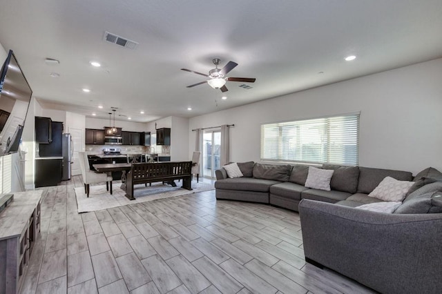 99 N Whittier Ave, Fresno, CA 93727 - living area with recessed lighting, a ceiling fan, and light wood-style floors