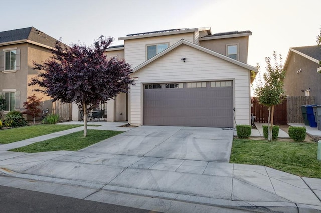 99 N Whittier Ave, Fresno, CA 93727 - traditional home featuring driveway and a garage