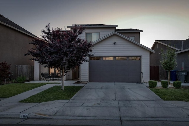 99 N Whittier Ave, Fresno, CA 93727 - view of front of house with concrete driveway and fence