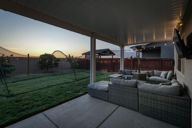 99 N Whittier Ave, Fresno, CA 93727 - patio terrace at dusk with outdoor lounge area