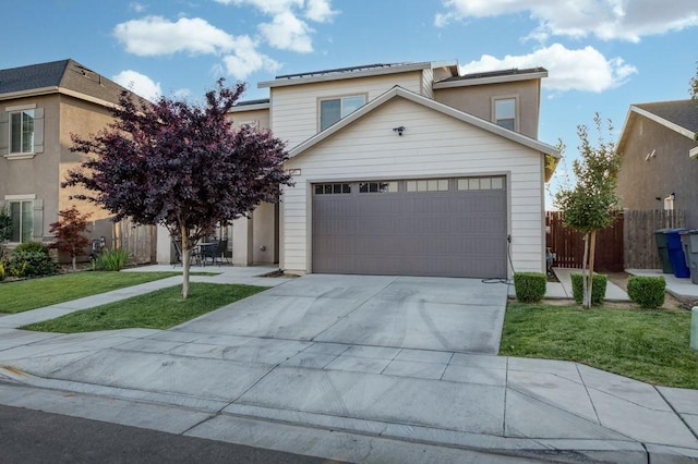 99 N Whittier Ave, Fresno, CA 93727 - traditional home with an attached garage and driveway