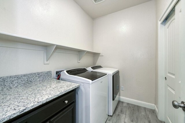 99 N Whittier Ave, Fresno, CA 93727 - clothes washing area with light wood-type flooring, baseboards, and separate washer and dryer