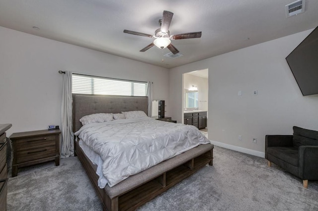 99 N Whittier Ave, Fresno, CA 93727 - bedroom with carpet flooring, baseboards, ceiling fan, and connected bathroom