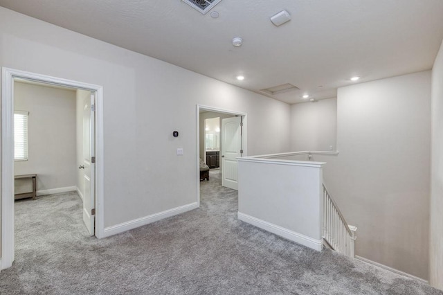 99 N Whittier Ave, Fresno, CA 93727 - spare room featuring carpet floors, baseboards, recessed lighting, and a smoke detector