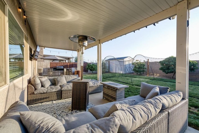 99 N Whittier Ave, Fresno, CA 93727 - view of patio with an outdoor living space and exterior kitchen