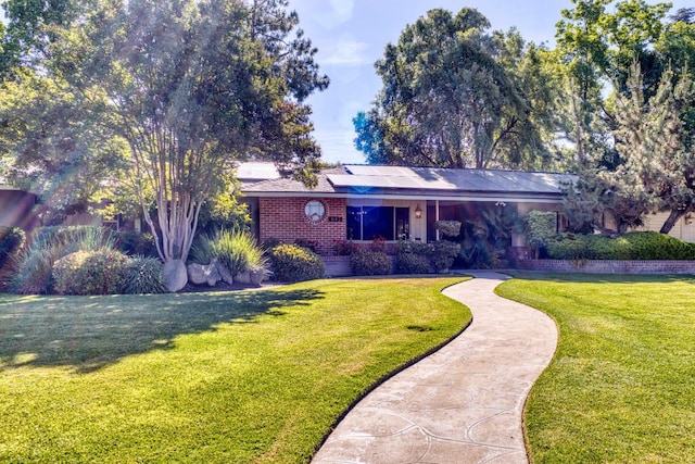 643 Park Ln, Madera, CA 93637 - single story home featuring a front lawn and brick siding