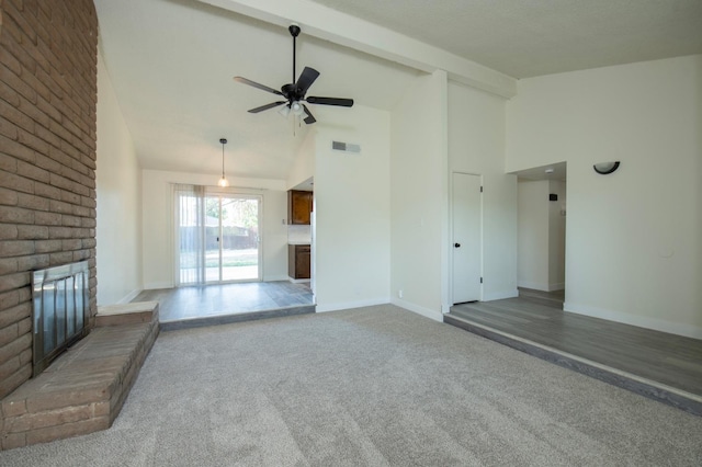 unfurnished living room featuring a brick fireplace, carpet flooring, high vaulted ceiling, baseboards, and a ceiling fan