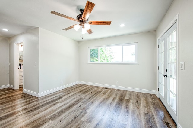 6117 N Colonial Ave, Fresno, CA 93704 - empty room with wood finished floors, recessed lighting, baseboards, and a ceiling fan