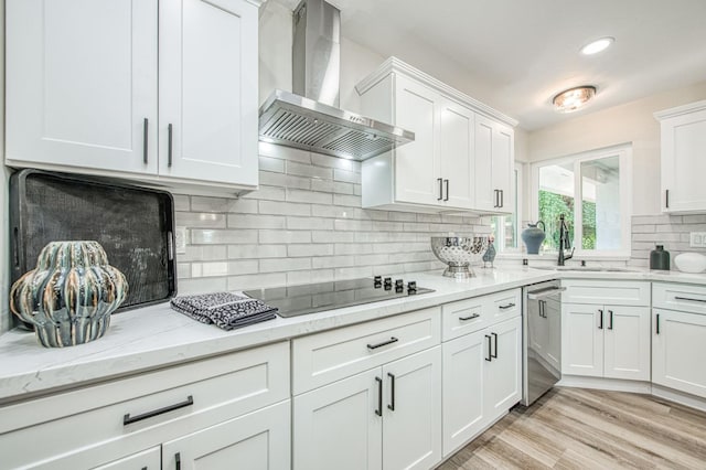 6117 N Colonial Ave, Fresno, CA 93704 - kitchen with wall chimney exhaust hood, stainless steel dishwasher, a sink, and white cabinets