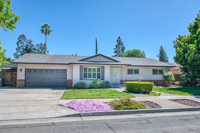1487 W Paul Ave, Fresno, CA 93711 - ranch-style house featuring a garage, brick siding, driveway, and stucco siding