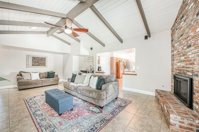 1487 W Paul Ave, Fresno, CA 93711 - living room featuring light tile patterned floors, ceiling fan, and a fireplace