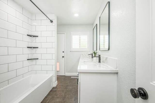 1487 W Paul Ave, Fresno, CA 93711 - full bathroom with double vanity and shower / tub combination
