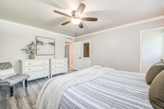 1487 W Paul Ave, Fresno, CA 93711 - bedroom with wood finished floors, ornamental molding, and ceiling fan