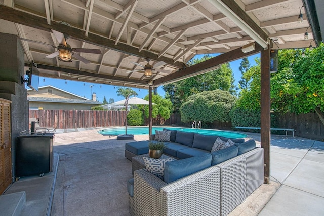 1487 W Paul Ave, Fresno, CA 93711 - fenced backyard with a ceiling fan, an outdoor living space, and a patio area