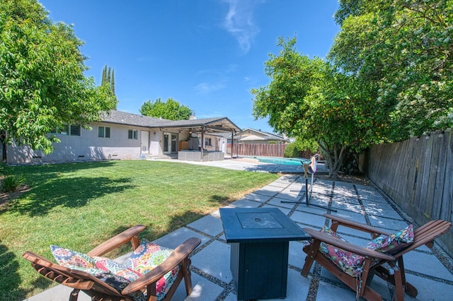 1487 W Paul Ave, Fresno, CA 93711 - view of yard featuring a patio area and a fire pit
