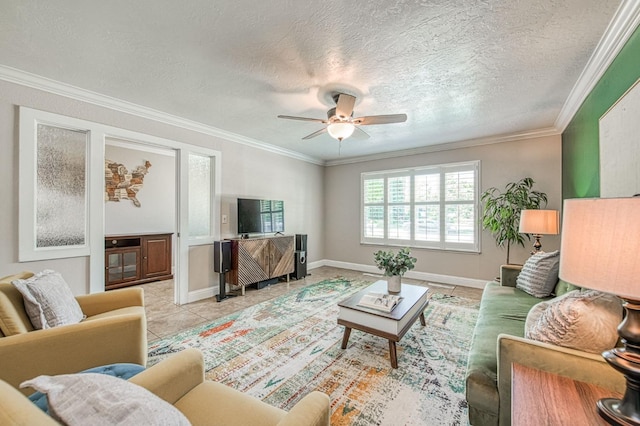1487 W Paul Ave, Fresno, CA 93711 - living room featuring a ceiling fan, ornamental molding, light tile patterned floors, a textured ceiling, and baseboards