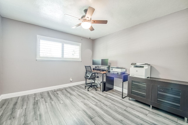 1487 W Paul Ave, Fresno, CA 93711 - office area with wood finished floors, ceiling fan, baseboards, and a textured ceiling