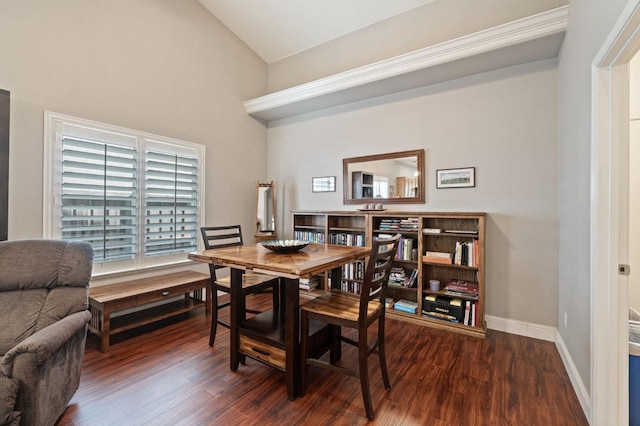 6423 N Bain Ave, Fresno, CA 93722 - dining space featuring dark wood-type flooring, baseboards, and high vaulted ceiling