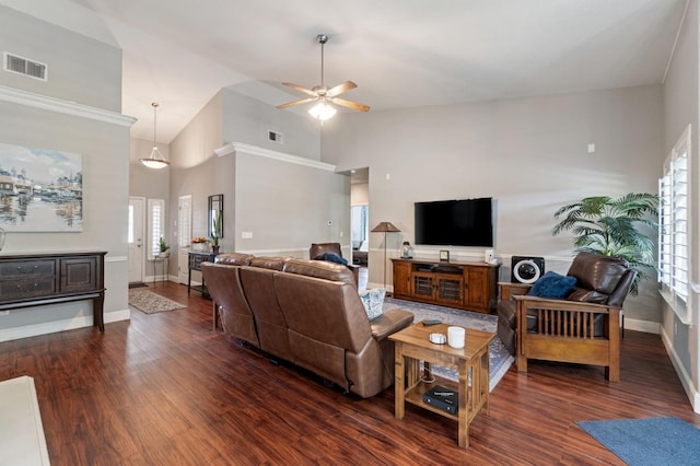 6423 N Bain Ave, Fresno, CA 93722 - living area with ceiling fan, dark wood-style flooring, baseboards, and high vaulted ceiling