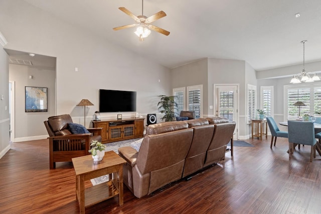 6423 N Bain Ave, Fresno, CA 93722 - living room featuring high vaulted ceiling, dark wood-type flooring, baseboards, a chandelier, and ceiling fan