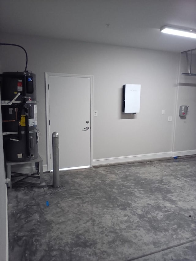 820 Shasta St, Madera, CA 93638 - garage featuring baseboards