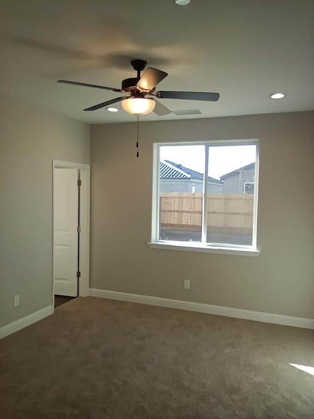 986 S Koleen Ave, Kerman, CA 93630 - carpeted empty room with ceiling fan, baseboards, and recessed lighting