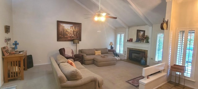 6300 N Palm Ave Unit 108, Fresno, CA 93710 - carpeted living area with a ceiling fan, beamed ceiling, a glass covered fireplace, baseboards, and high vaulted ceiling
