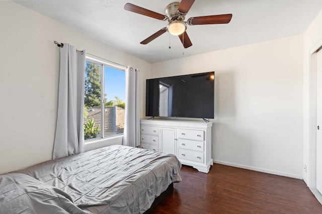 977 E Pennsylvania Ave, Fresno, CA 93720 - bedroom with wood finished floors, a ceiling fan, and baseboards