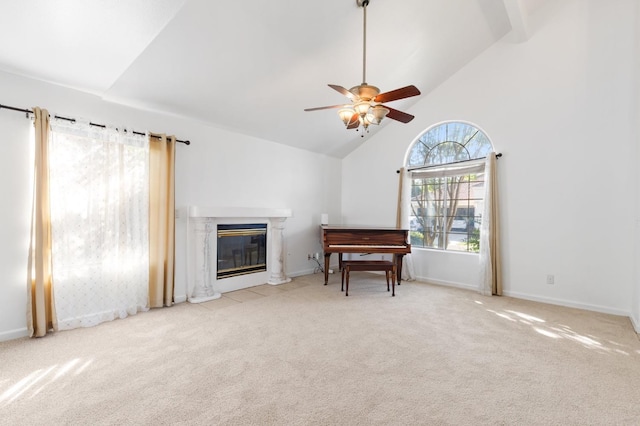 977 E Pennsylvania Ave, Fresno, CA 93720 - sitting room with carpet flooring, a fireplace, a ceiling fan, high vaulted ceiling, and baseboards