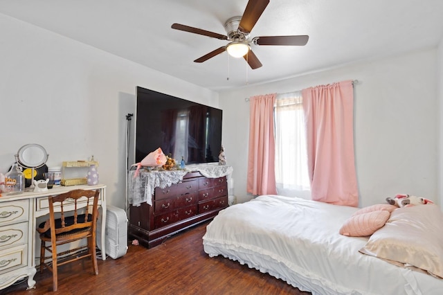 977 E Pennsylvania Ave, Fresno, CA 93720 - bedroom with a desk, wood finished floors, and a ceiling fan