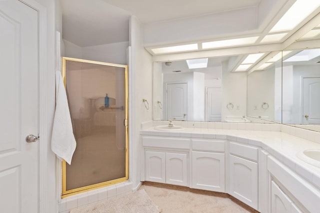 977 E Pennsylvania Ave, Fresno, CA 93720 - bathroom with a shower stall and double vanity