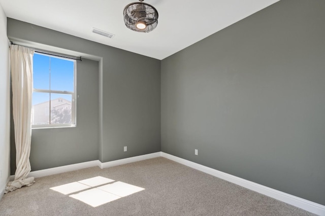 11289 N Alicante Dr, Fresno, CA 93730 - spare room featuring carpet and baseboards