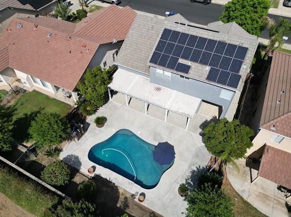 view of property location featuring a pool area