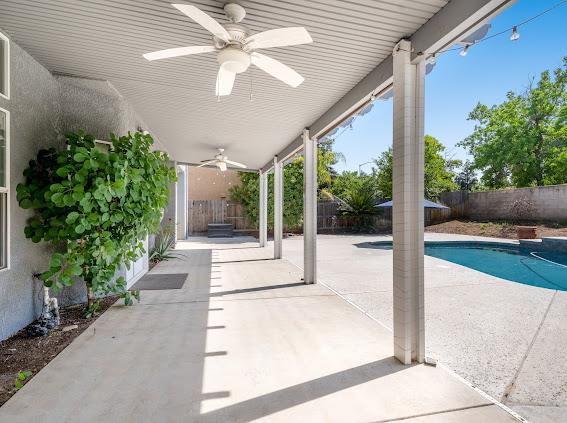 view of patio with a ceiling fan and a fenced backyard