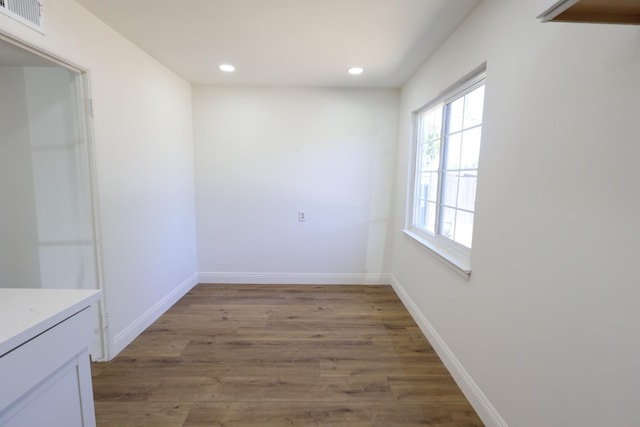 445 Shaw Ave, Clovis, CA 93612 - unfurnished dining area featuring recessed lighting, light wood-style floors, and baseboards