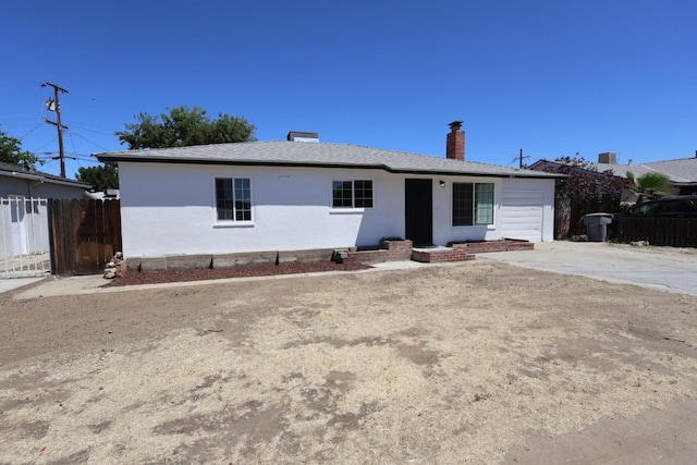 445 Shaw Ave, Clovis, CA 93612 - ranch-style house featuring fence, a chimney, and stucco siding