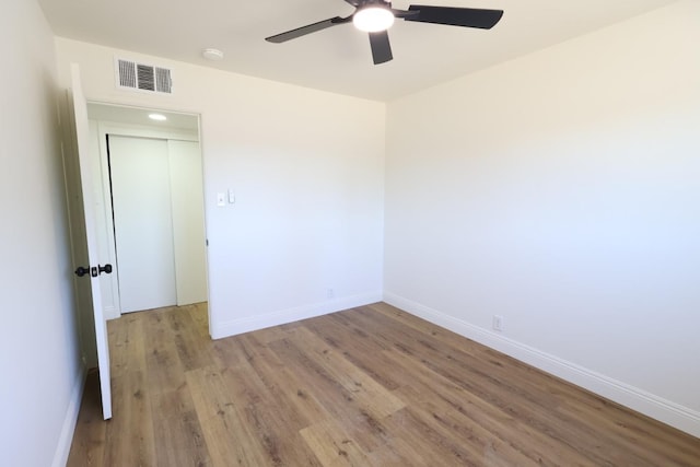 445 Shaw Ave, Clovis, CA 93612 - spare room featuring a ceiling fan, wood finished floors, baseboards, and a smoke detector