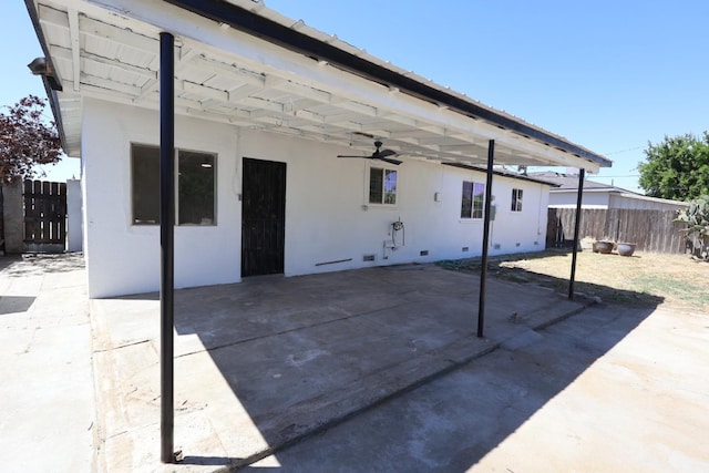 445 Shaw Ave, Clovis, CA 93612 - view of patio featuring a ceiling fan, fence, and a carport