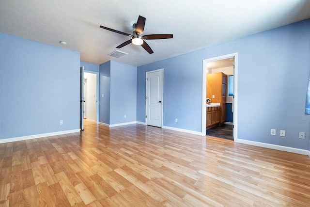 6254 E Bellaire Way, Fresno, CA 93727 - unfurnished bedroom with light wood-style flooring, ensuite bath, and ceiling fan