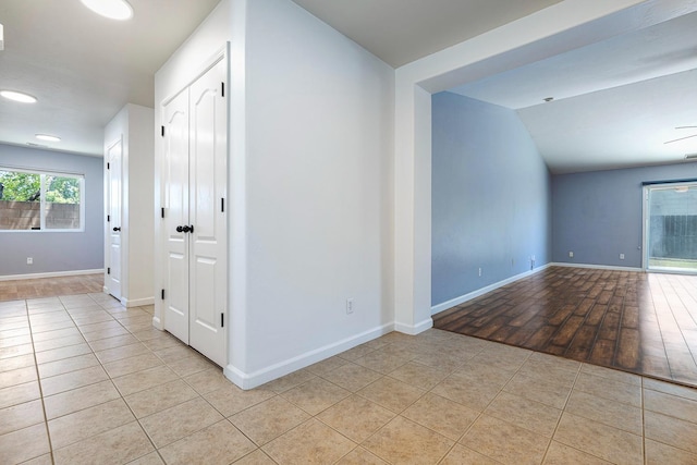 6254 E Bellaire Way, Fresno, CA 93727 - empty room featuring light tile patterned floors and baseboards