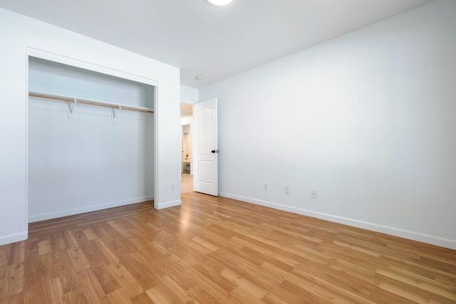 6254 E Bellaire Way, Fresno, CA 93727 - unfurnished bedroom with light wood finished floors and a closet