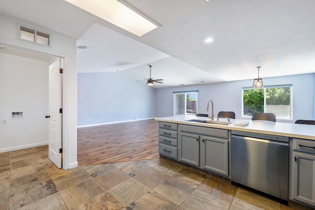 6254 E Bellaire Way, Fresno, CA 93727 - kitchen with dishwasher, gray cabinetry, light countertops, ceiling fan, and healthy amount of natural light