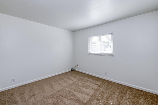 5535 N Millbrook Ave, Fresno, CA 93710 - carpeted spare room featuring baseboards
