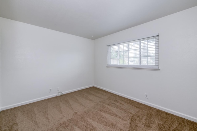 5535 N Millbrook Ave, Fresno, CA 93710 - carpeted empty room with baseboards