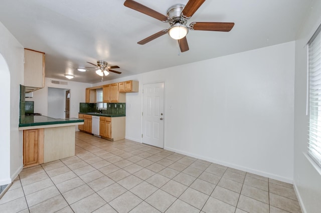 5535 N Millbrook Ave, Fresno, CA 93710 - kitchen featuring dishwasher, light brown cabinetry, backsplash, light tile patterned floors, and ceiling fan