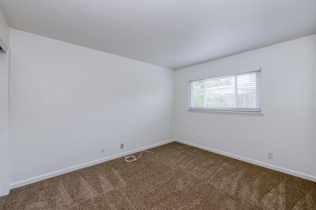 5535 N Millbrook Ave, Fresno, CA 93710 - unfurnished room featuring carpet floors and baseboards