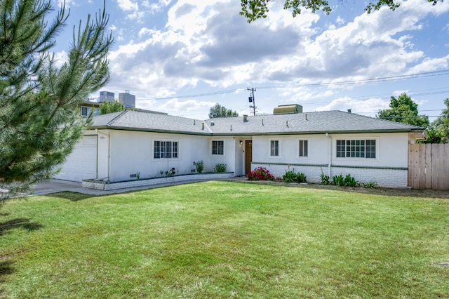 5535 N Millbrook Ave, Fresno, CA 93710 - back of property with stucco siding, an attached garage, and brick siding