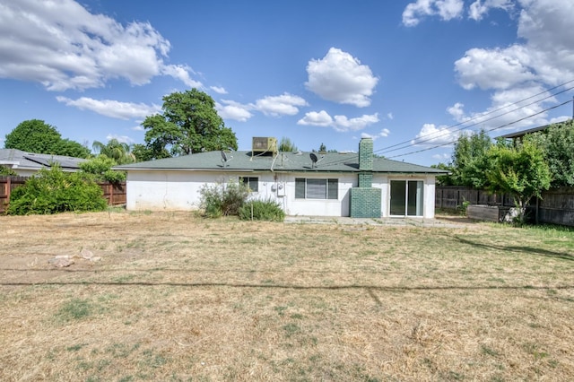 5535 N Millbrook Ave, Fresno, CA 93710 - back of house featuring a chimney